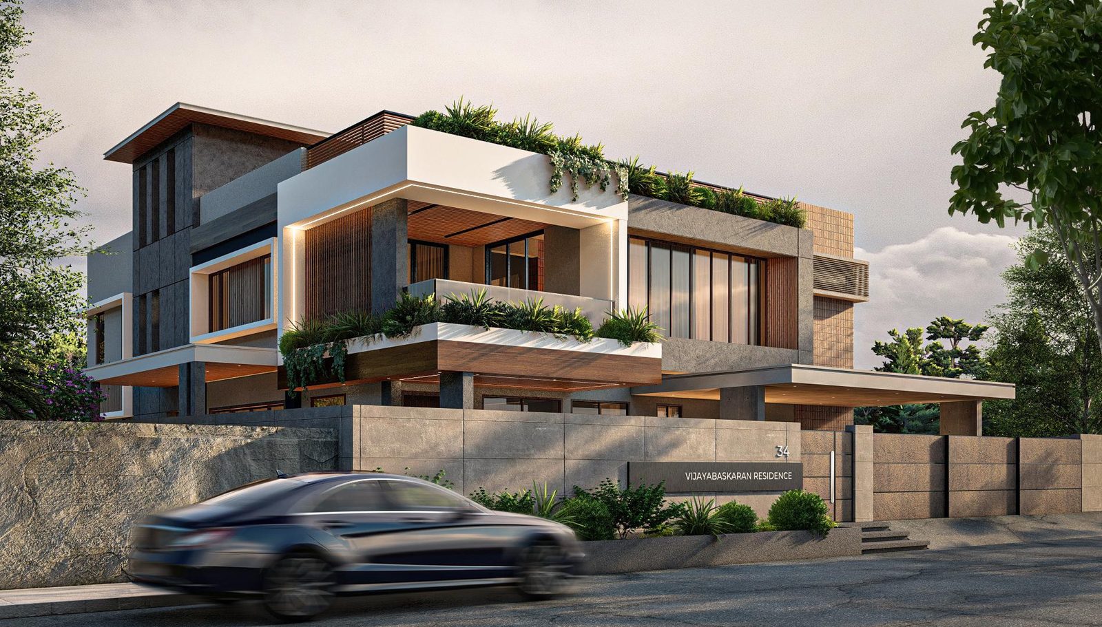 Vijayabaskaran Residence at dusk, layered volumes with rooftop planting